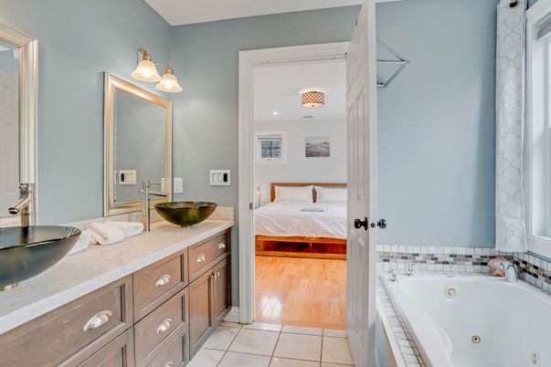 Bathroom, Bedroom, Dual Sink Vanities, Interior, Recessed Lighting, Wood Texture Flooring