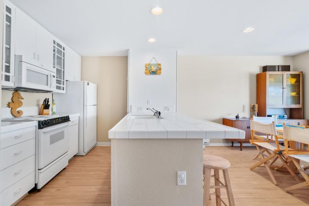 Dining room, Interior, Kitchen, Recessed Lighting, Tile Countertops, Wood Texture Flooring