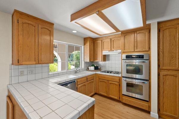 Interior, Kitchen, Recessed Lighting, Stainless Steel Appliances, Tile Countertops, Wooden Beams, Wood Texture Flooring