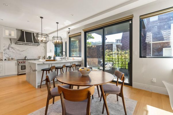 Dining room, Interior, Kitchen, Marble Walls, Pendant Lights, Recessed Lighting, Stainless Steel Appliances, Wood Texture Flooring