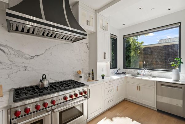 Interior, Kitchen, Marble Walls, Recessed Lighting, Stainless Steel Appliances, Wood Texture Flooring