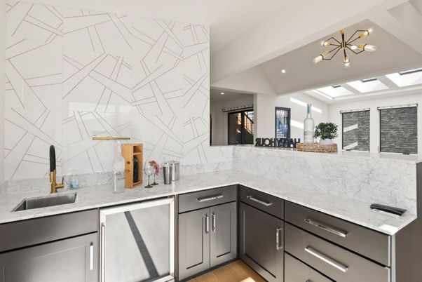Interior, Kitchen, Marble Walls, Pendant Lights, Recessed Lighting, Stainless Steel Appliances, Wood Texture Flooring
