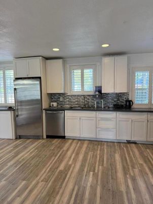 Interior, Kitchen, Recessed Lighting, Stainless Steel Appliances, Wood Texture Flooring