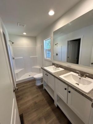 Bathroom, Dual Sink Vanities, Interior, Recessed Lighting, Wood Texture Flooring