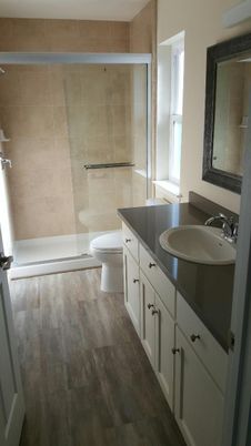 Bathroom, Dual Sink Vanities, Glass Shower, Interior, Wood Texture Flooring