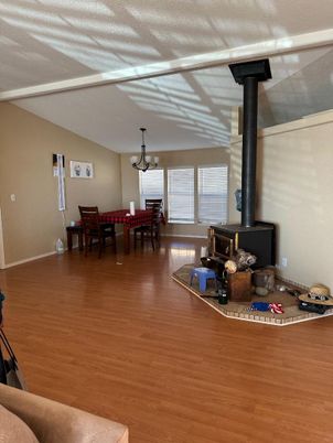 Chandelier, Dining room, Fireplace, Interior, Wood Texture Flooring