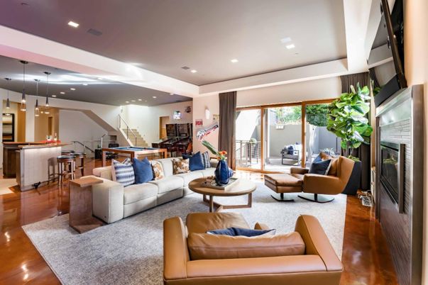 Billiard Table, Fireplace, Game Room, Interior, Living room, Pendant Lights, Recessed Lighting, Wood Texture Flooring