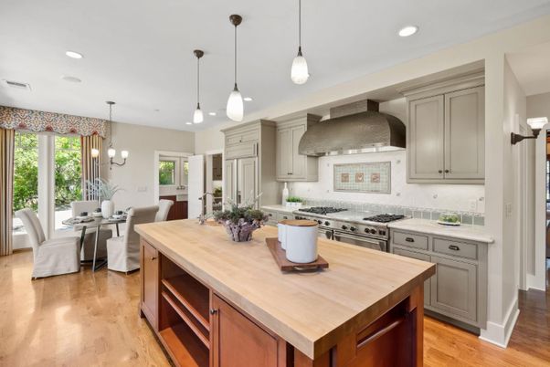 Chandelier, Dining room, Interior, Kitchen, Pendant Lights, Recessed Lighting, Stainless Steel Appliances, Wood Texture Flooring