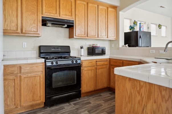 Interior, Kitchen, Tile Countertops, Wood Texture Flooring