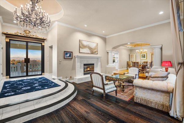 Chandelier, Dining room, Fireplace, Interior, Living room, Recessed Lighting, Wood Texture Flooring
