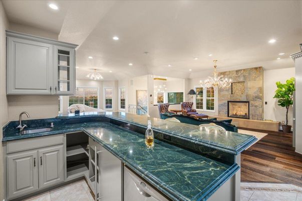 Chandelier, Fireplace, Interior, Kitchen, Recessed Lighting, Wood Texture Flooring