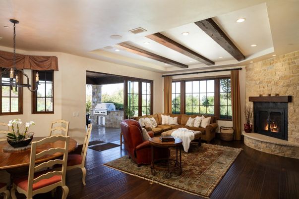Dining room, Fireplace, Interior, Living room, Pendant Lights, Recessed Lighting, Stone Walls, Wooden Beams, Wood Texture Flooring