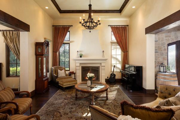 Chandelier, Fireplace, Interior, Living room, Piano, Recessed Lighting, Stone Walls, Wooden Beams, Wood Texture Flooring