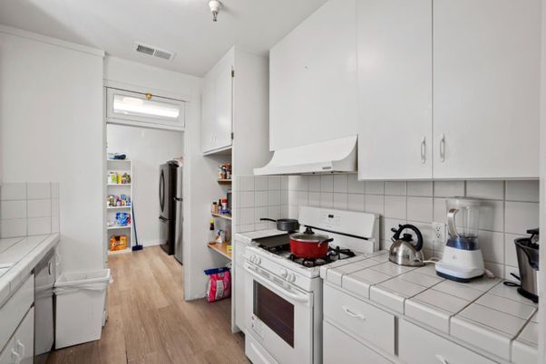 Interior, Kitchen, Tile Countertops, Wood Texture Flooring