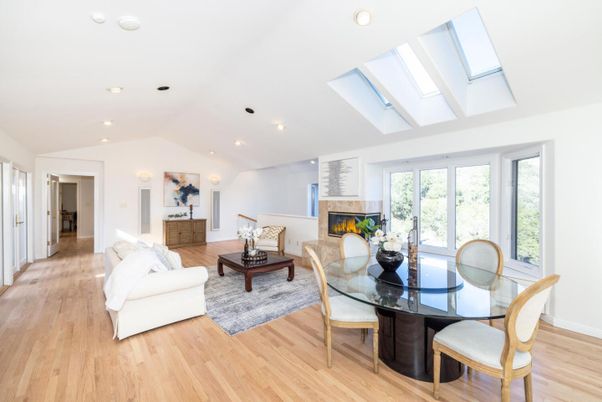 Dining room, Fireplace, Interior, Living room, Recessed Lighting, Wood Texture Flooring