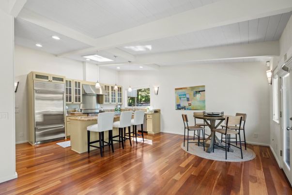 Dining room, Interior, Kitchen, Pendant Lights, Recessed Lighting, Stainless Steel Appliances, Wood Texture Flooring
