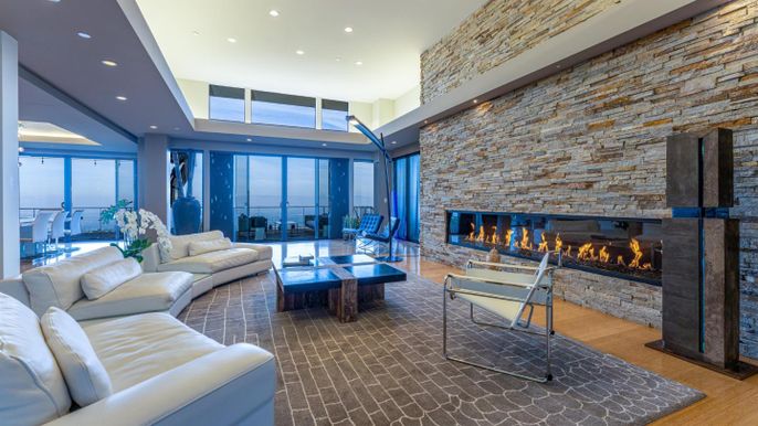 Fireplace, Interior, Living room, Recessed Lighting, Stone Walls, Wood Texture Flooring