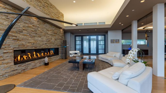 Fireplace, Interior, Living room, Recessed Lighting, Stone Walls, Wood Texture Flooring