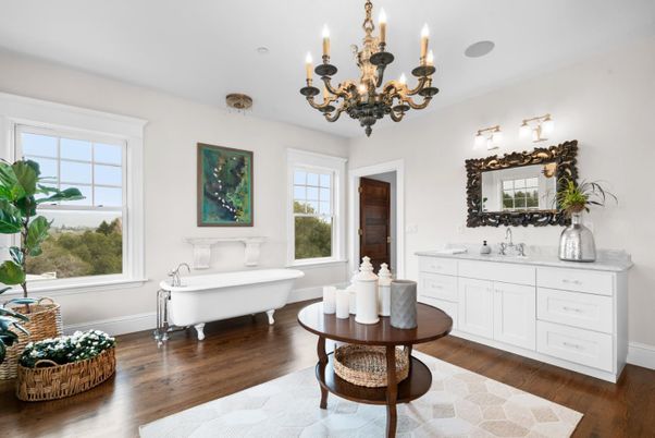 Bathroom, Chandelier, Dual Sink Vanities, Free Standing Baths, Interior, Wood Texture Flooring