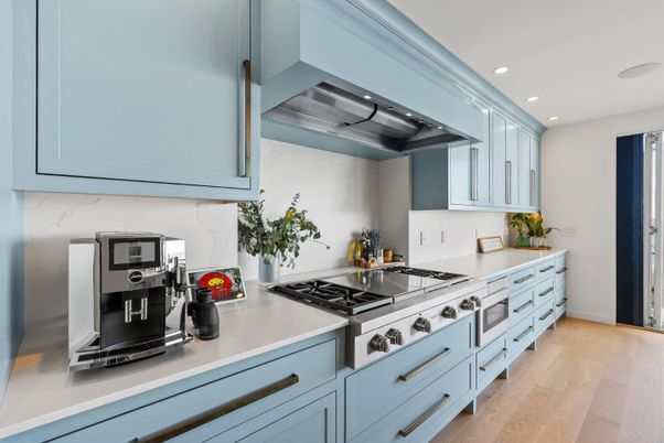 Interior, Kitchen, Marble Walls, Recessed Lighting, Stainless Steel Appliances, Wood Texture Flooring