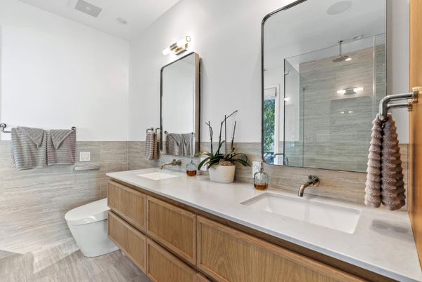 Bathroom, Dual Sink Vanities, Glass Shower, Interior, Wood Texture Flooring