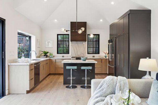 Interior, Kitchen, Marble Walls, Pendant Lights, Recessed Lighting, Stainless Steel Appliances, Wood Texture Flooring