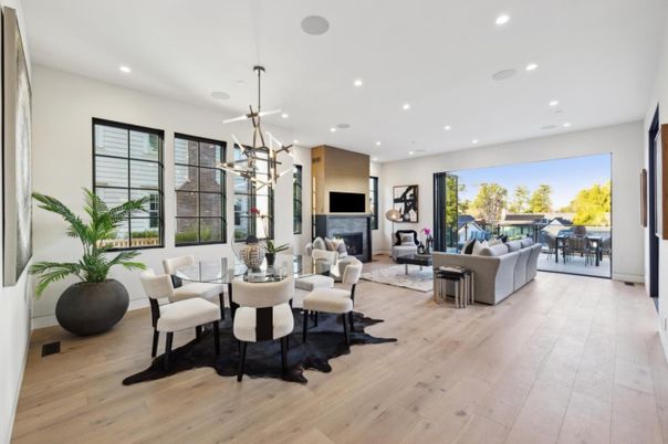 Dining room, Fireplace, Interior, Living room, Pendant Lights, Recessed Lighting, Wood Texture Flooring