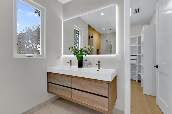 Bathroom, Dual Sink Vanities, Interior, Recessed Lighting, Wood Texture Flooring