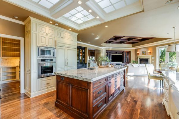 Fireplace, Interior, Kitchen, Living room, Pendant Lights, Recessed Lighting, Stainless Steel Appliances, Wood Texture Flooring