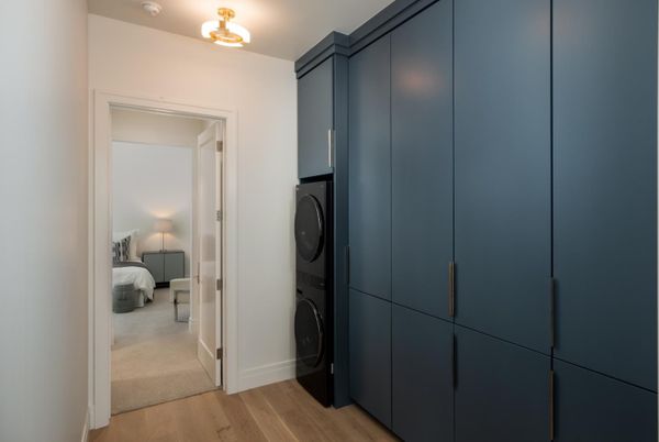 Bedroom, Interior, Utility Closets, Washer, Wood Texture Flooring