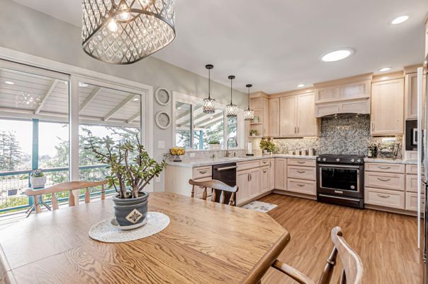 Dining room, Interior, Kitchen, Pendant Lights, Recessed Lighting, Stainless Steel Appliances, Wood Texture Flooring