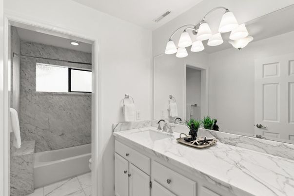 Bathroom, Dual Sink Vanities, Interior, Marble, Marble Walls, Recessed Lighting