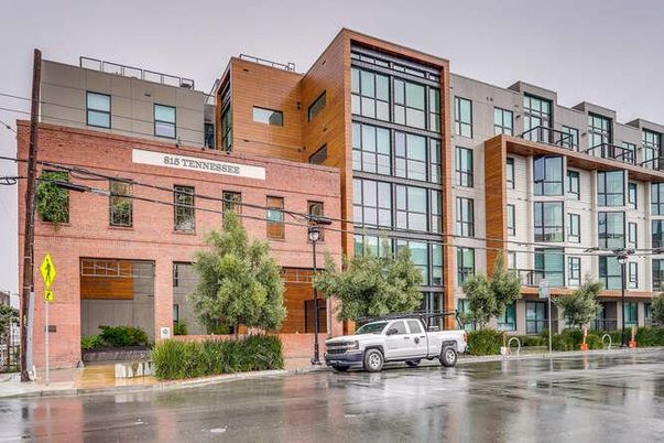 Exterior, Facade, Brick Facade, Condo Building