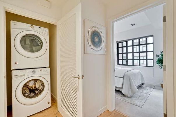 Bedroom, Interior, Utility Closets, Washer, Wood Texture Flooring