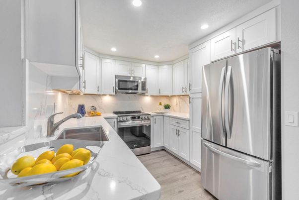 Interior, Kitchen, Recessed Lighting, Stainless Steel Appliances, Wood Texture Flooring