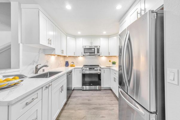 Interior, Kitchen, Recessed Lighting, Stainless Steel Appliances, Wood Texture Flooring