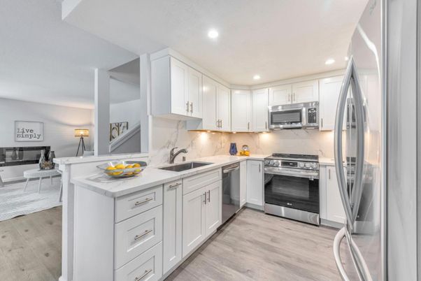 Interior, Kitchen, Recessed Lighting, Stainless Steel Appliances, Wood Texture Flooring