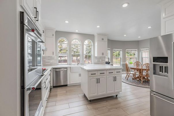 Dining room, Interior, Kitchen, Recessed Lighting, Stainless Steel Appliances, Wood Texture Flooring