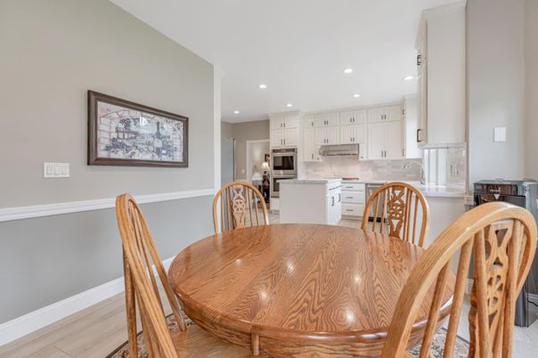 Dining room, Interior, Kitchen, Recessed Lighting, Stainless Steel Appliances, Wood Texture Flooring