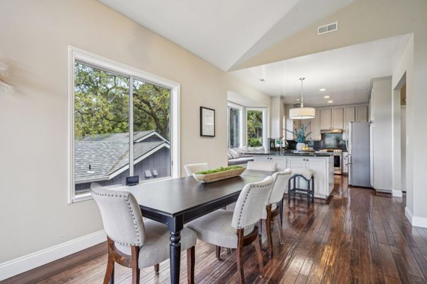 Dining room, Interior, Kitchen, Pendant Lights, Recessed Lighting, Stainless Steel Appliances, Wood Texture Flooring