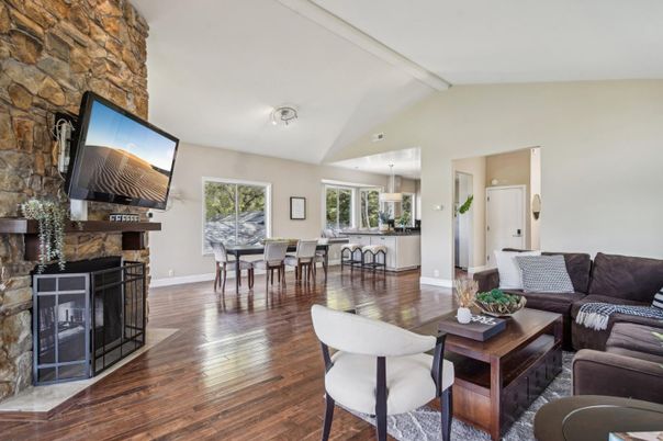Dining room, Fireplace, Interior, Kitchen, Living room, Pendant Lights, Stone Walls, Wood Texture Flooring