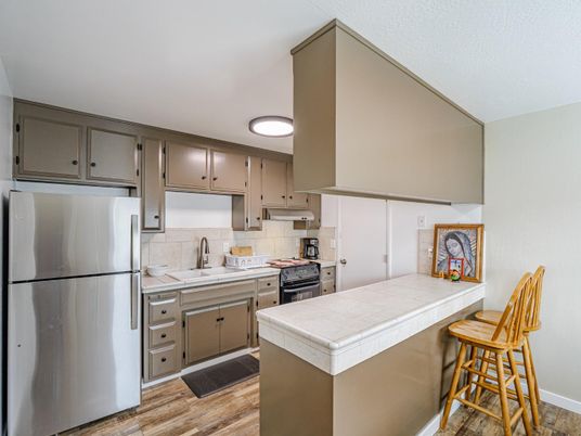 Interior, Kitchen, Tile Countertops, Wood Texture Flooring