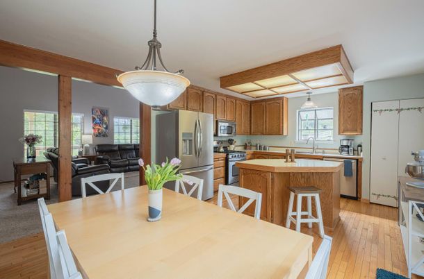 Dining room, Interior, Kitchen, Living room, Pendant Lights, Stainless Steel Appliances, Wood Texture Flooring