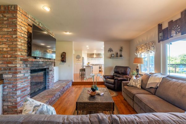 Fireplace, Interior, Living room, Recessed Lighting, Stone Walls, Wood Texture Flooring