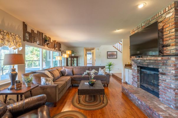 Fireplace, Interior, Living room, Recessed Lighting, Stone Walls, Wood Texture Flooring