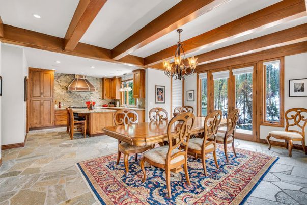 Chandelier, Dining room, Interior, Kitchen, Pendant Lights, Recessed Lighting, Stone Walls, Wooden Beams