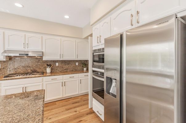 Interior, Kitchen, Recessed Lighting, Stainless Steel Appliances, Wood Texture Flooring