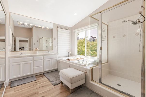 Bathroom, Dual Sink Vanities, Glass Shower, Interior, Recessed Lighting, Wood Texture Flooring