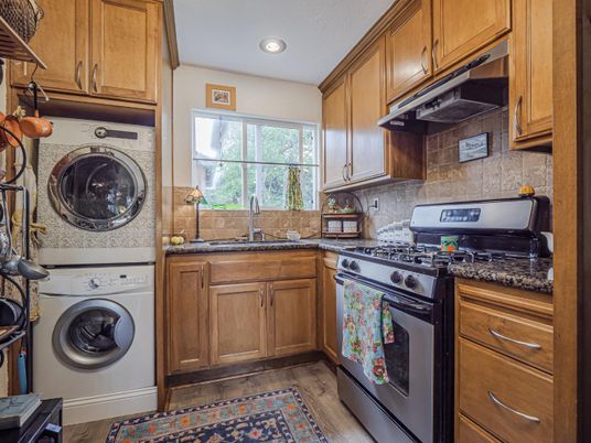 Interior, Kitchen, Recessed Lighting, Washer, Wood Texture Flooring