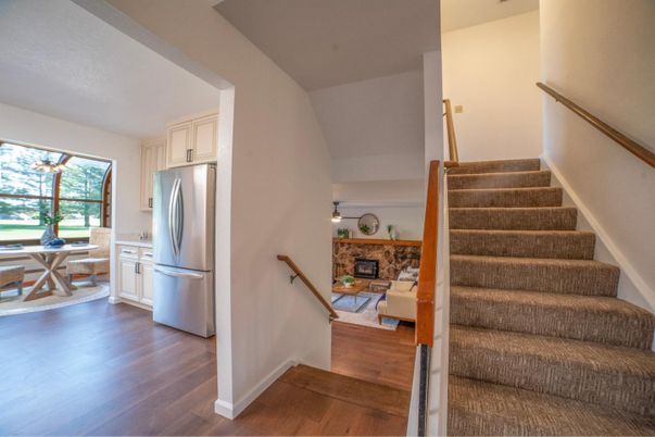 Dining room, Fireplace, Interior, Kitchen, Living room, Stainless Steel Appliances, Wood Texture Flooring